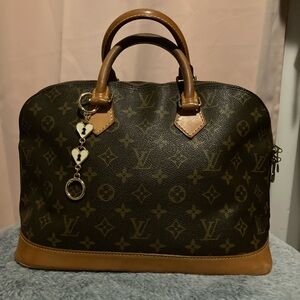 Louis Vuitton Alma Brown Monogram Bag with Heart Charm